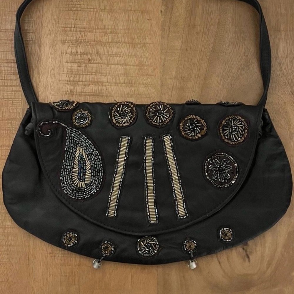 Vintage United Colors of Benetton leather shoulder bag.